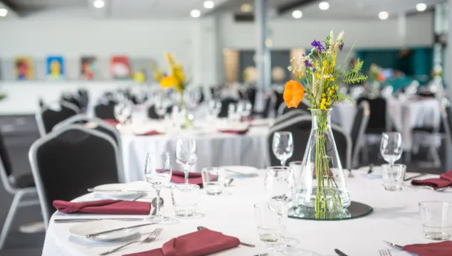 Big room set up for an elegant dinner