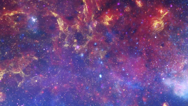 a matched trio of images of the central region of our Milky Way galaxy. Full of reds, yellows and blues.