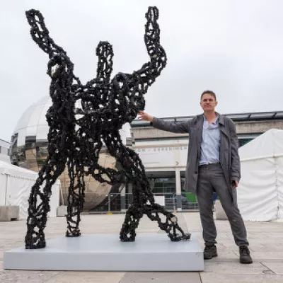 Artist Luke Jerram with his Inhale sculpture 