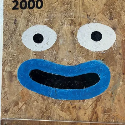 A smiley face painted on to the Curious Timeline. Artist: Tom Sears