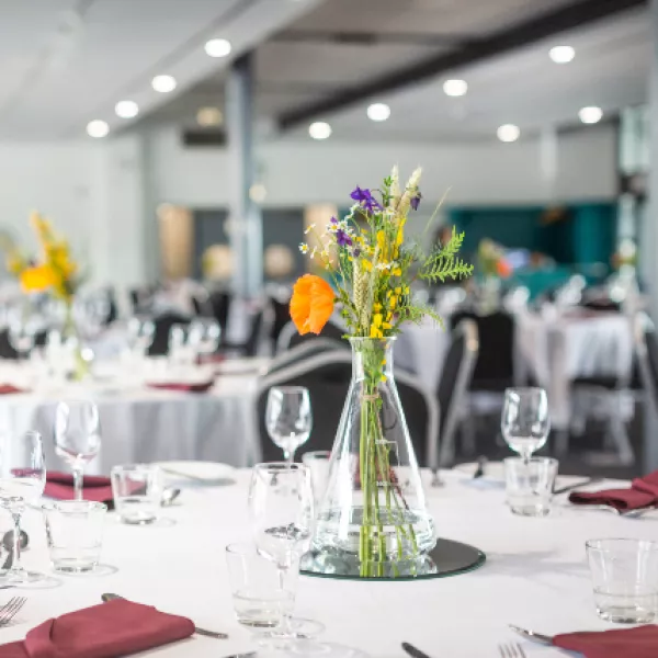 Big room set up for an elegant dinner